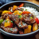 Black Pepper Beef Stir-Fry with Rainbow Peppers and Sesame Finish